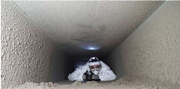 Dirty duct with technician